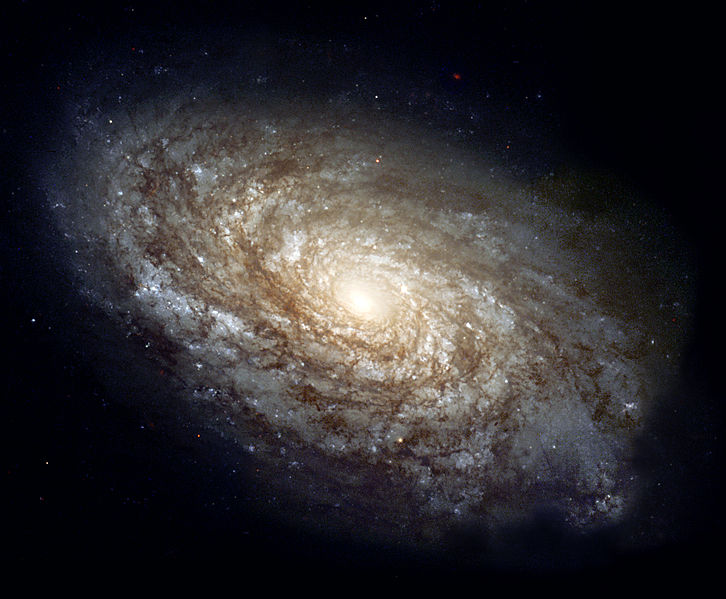 NGC 4414, o galaxie spirala tipică în constelatia Coma Berenices, are aproximativ 56.000 de ani-lumină în diametru şi este la o distanţă de aproximativ 60 de milioane de ani-lumină
