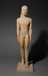 Statuia de marmură a unui kouros.
