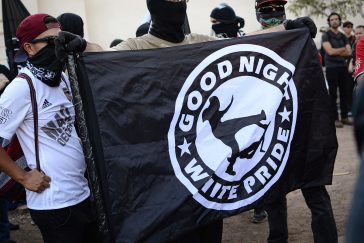Anti-fascists with banner reading "good night white pride", 2017